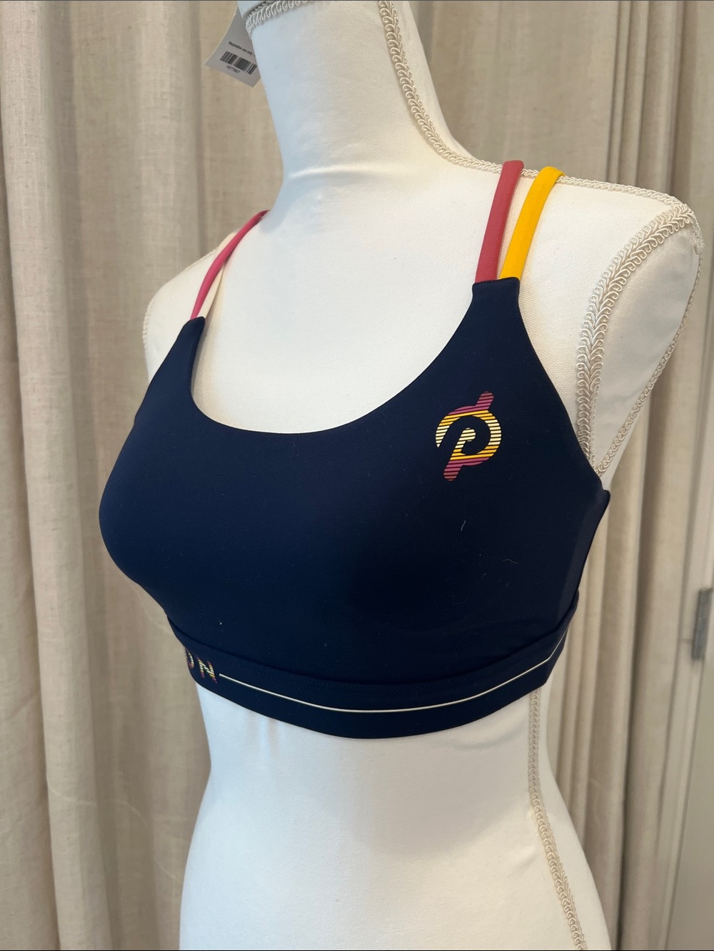 Peloton Navy Sports Bra with Pink & Yellow Straps